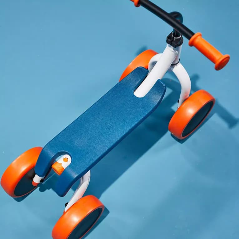 Беговел бело-оранжевый B'Twin 100 RunBike Evolutive