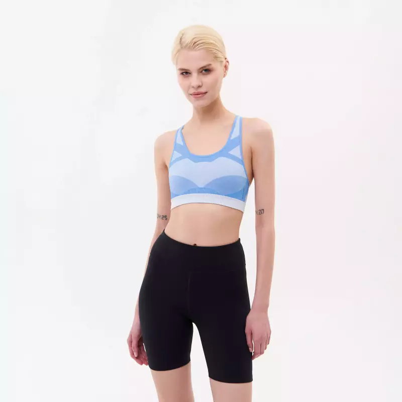 Бра для фитнеса женский голубой Domyos Seamless 500
