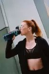 Брюки для бега женские черные Kalenji Warm 500