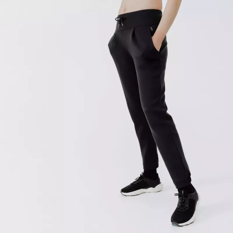 Брюки для бега женские черные Kalenji Warm 500